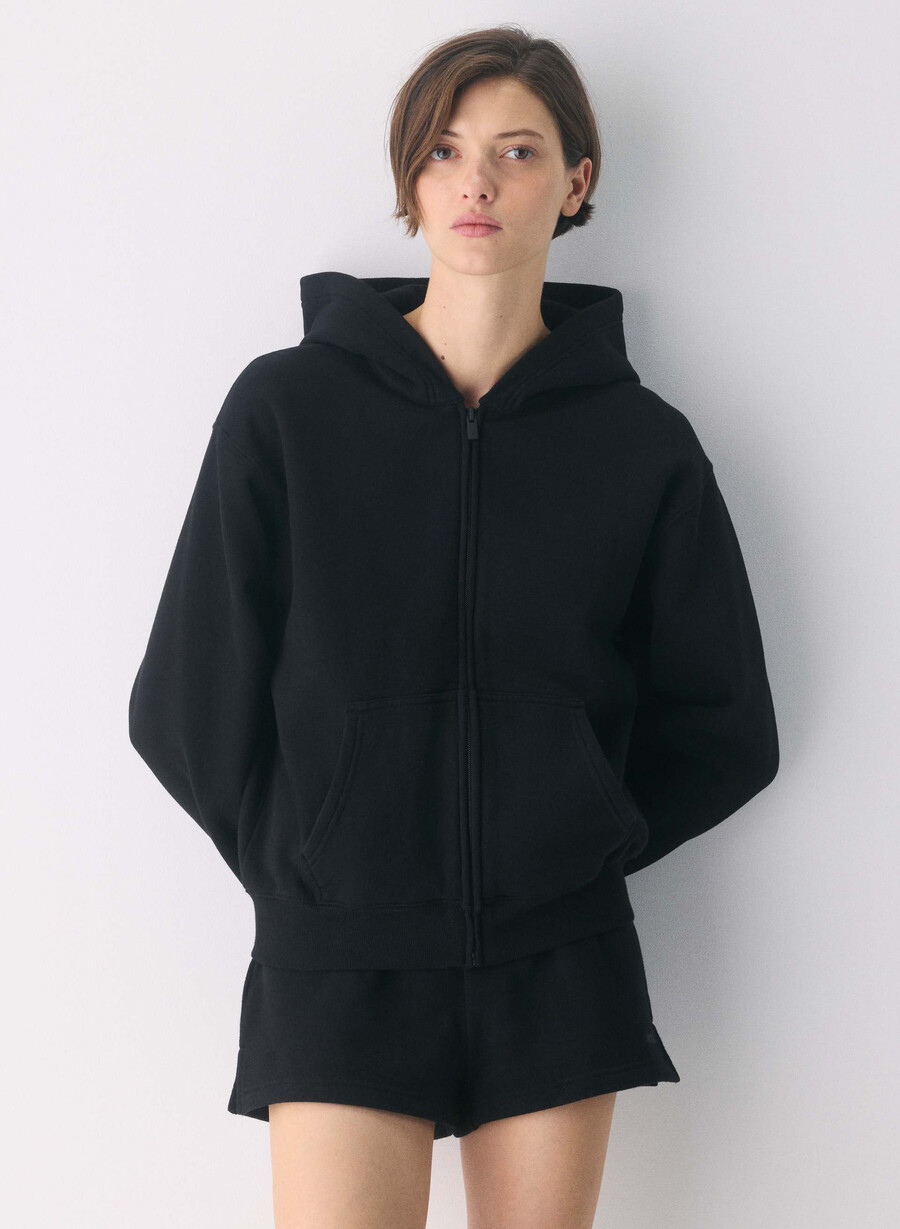 felpa con cappuccio e zip perfetta cozy sweatfleece nera
