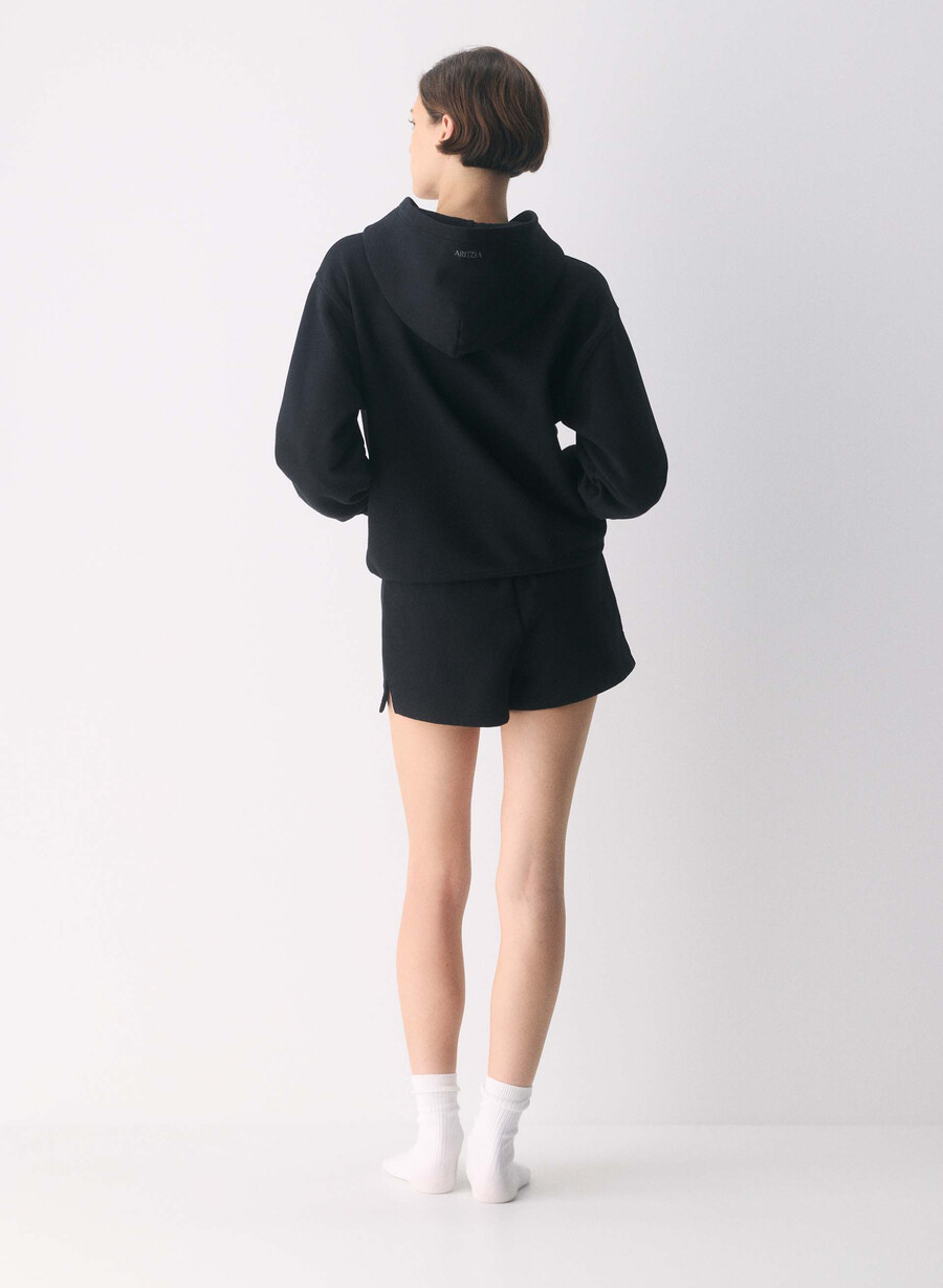 felpa con cappuccio e zip perfetta cozy sweatfleece nera