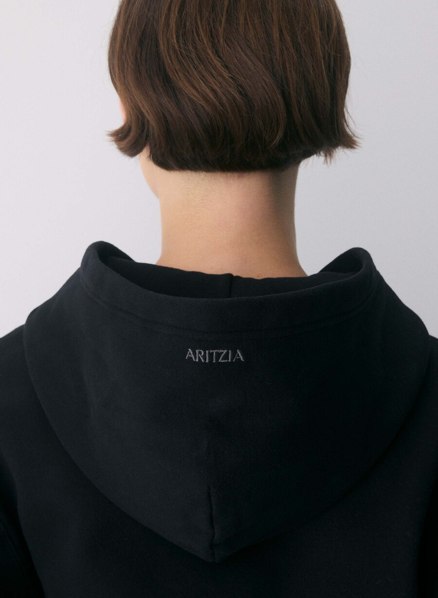 felpa con cappuccio e zip perfetta cozy sweatfleece nera