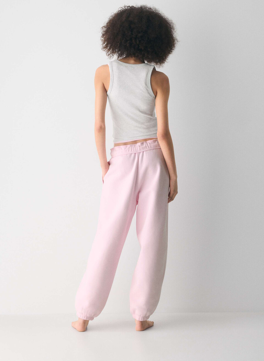 pantaloni da jogging larghi e ripiegabili in felpa cozy sweatfleece villa pink