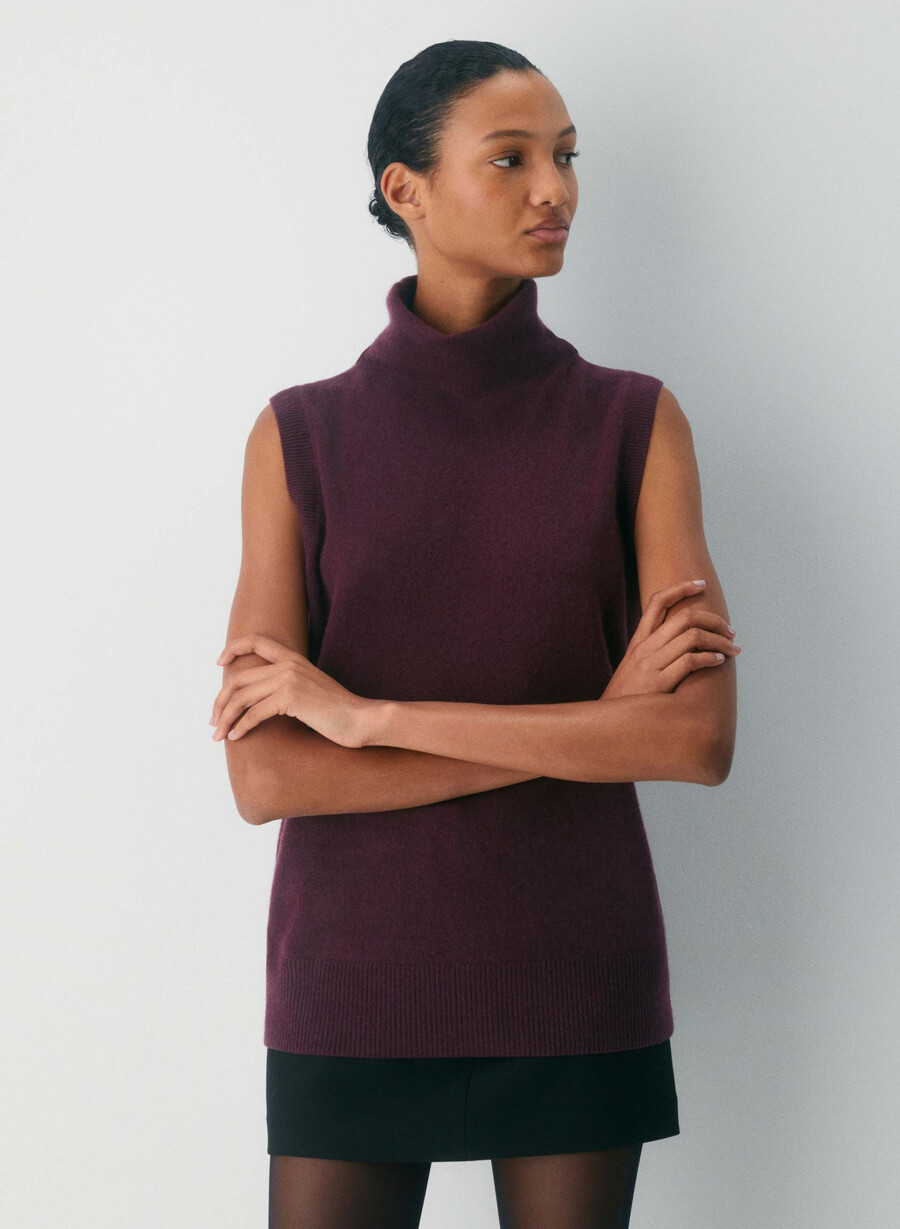 canotta a collo alto in cashmere e piume colore bianco sussurramento