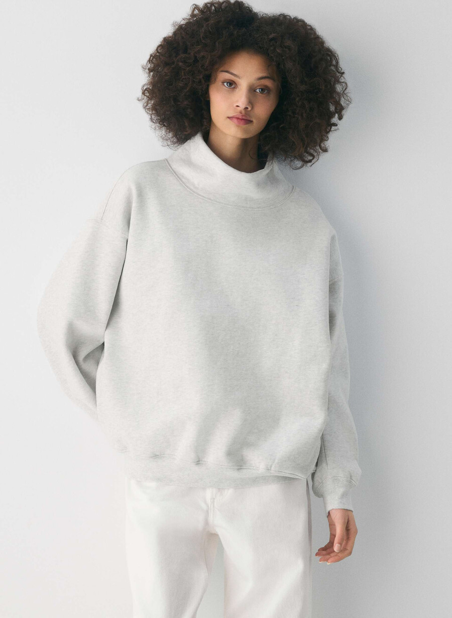 felpa in pile con collo a imbuto comoda e calda colore bianco nuvola