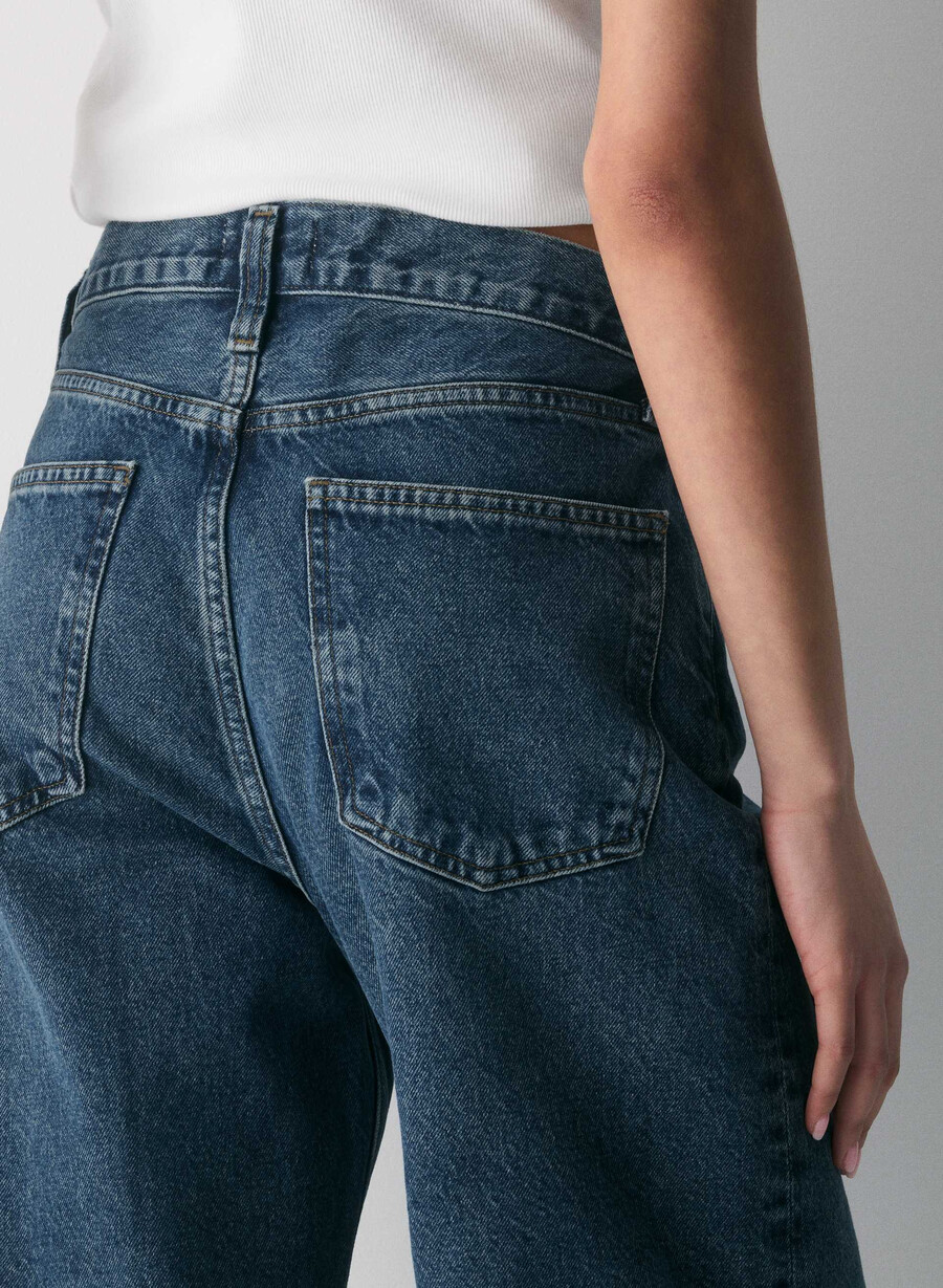 agolde arc criss cross jean forma
